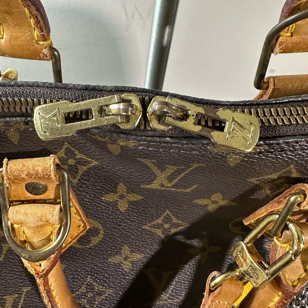 Louis Vuitton Brown and Tan Monogram with strap and keychain charm - Picture 9 of 13